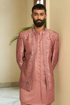 Pink bandhgala jacket with floral embroidery. Paired with kurta and pant.
Component: 3
Pattern: Embroidered
Type Of Work: Floral
Neckline: Bandhgala: Open
Sleeve Type: Bandhgala: Full
Fabric: Pure Silk
Color: Pink
Other Details: 
Weight (in gm): 800
Floral motifs
Front buttons
Occasion: Wedding - Aza Fashions Onion Pink, Rose Jacket, Add Sleeves, Indian Wedding Wear, Wear Store, Open Sleeve, Fashion App, Pink Jacket, Pink Silk