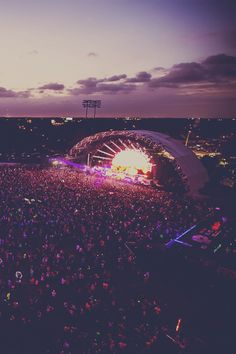 an aerial view of a concert at night