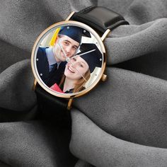 Limited to Graduates wearing Graduation Caps. Graduation is an adorable milestone of growth that deserves a unique custom watch as a gift souvenir, and this is why we offer a special price. Surprise the graduate with a custom photo watch that fits any personality and never goes out of style. The image is printed on the watch surface and lasts for good. Add your message at the back to make the watch more precious. Watch Case: Special Alloy and Glass Case Color: Silver Case Outside Diameter: 1.57 Customizable Black Watches For Gifts, Customizable Black Watch As A Gift, Customizable Black Watches As Gift, Customizable Black Watch As Gift, Personalized Adjustable Watches As Gifts, Personalized Watches For Gifts, Personalized Watches As Gifts, Personalized Watches With Round Dial For Gifts, Caps Graduation