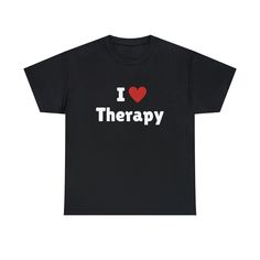 I Love Therapy T-Shirt, I Heart Therapy Tee Shirt This classic unisex jersey short sleeve tee fits like a well-loved favorite. Soft cotton and quality print make users fall in love with it over and over again. These t-shirts have-ribbed knit collars to bolster shaping. The shoulders have taping for better fit over time. Dual side seams hold the garment's shape for longer.  .: 100% Airlume combed and ringspun cotton (fiber content may vary for different colors) .: Light fabric (4.2 oz/yd² (142 g/ Black Short Sleeve T-shirt For Valentine's Day, Valentine's Day Black T-shirt With Text Print, Black Slogan T-shirt For Valentine's Day, Black Cotton T-shirt For Valentine's Day, Valentine's Day Black Slogan T-shirt, Valentine's Day Black T-shirt With Slogan, Valentine's Day Relaxed Fit T-shirt With Letter Print, Valentine's Day T-shirt With Slogan And Short Sleeves, Valentine's Day Slogan T-shirt Short Sleeve