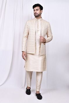 Cream jacket with thread embroidery in geometric pattern. Paired with matching kurta and pant. - Aza Fashions Fitted Zari Work Set With Stand Collar, Festive Fitted Sets With Stand Collar, Fitted Nehru Jacket With Stand Collar For Diwali, Fitted Nehru Jacket With Stand Collar For Festive Seasons, Festive Designer Wear Sets With Stand Collar, Fitted Outerwear With Cutdana For Festivals, Fitted Cutdana Outerwear For Festivals, Festive Stand Collar Sets For Diwali, Pant Art