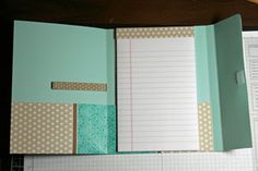 an open planner book sitting on top of a desk