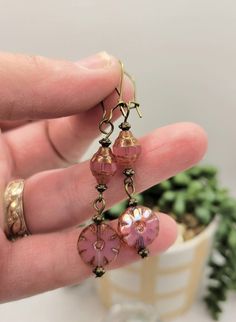 Beautiful Czech glass bead pink opaline blossom flower earrings made with antique bronze accents.  Antique bronze latch back earring wires.  Hypoallergenic.  Ships on an earring card with a plastic protective cover. Czech Beads Jewelry, Making Goals, Earring Inspo, Czech Glass Jewelry, Beaded Earrings Diy, Earring Card, Earring Wires, Earring Making, Earrings Diy