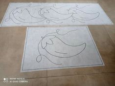 two rugs that have been drawn on the floor