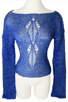 The Sapphire Top is a one of kind top that has open stitches that create a symmetrical design. #knitting #knit #knitwear #knittersofinstagram #knitstagram #knitted #knittingaddict #knittinglove #knitter #knits #knitters #knittersoftheworld #knitwears #knitlove #knittersofig #knittinginspiration #knithat #knittingpattern #knitaddict #knitsweater #knitt #knitlife #knittedhat #knitdress #knitsagram #knitspiration #knittersgonnaknit #KnittedSweater #knitdesign #knitweardesign Blue Open Knit Long Sleeve Tops, Blue Stretch Knit Top For Layering, Blue Knit Stretch Sweater, Blue Stretch Knit Sweater, Stretch Blue Knit Top For Winter, Blue Fitted Knit Sweater, Blue Fitted Textured Knit Sweater, Fitted Blue Knit Sweater, Blue Open Knit Sweater For Layering