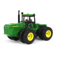 a green tractor with yellow tires on a white background