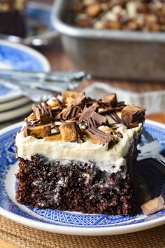 a piece of cake sitting on top of a blue and white plate