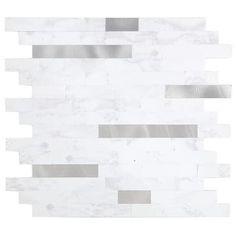 a white tile with silver lines on it