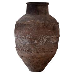 an old vase is shown on a white background for use as a decoration or object