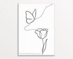 a black and white drawing of two flowers