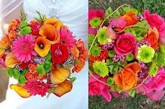 wedding bouquets and bride's bouquet on the grass, both with flowers in them