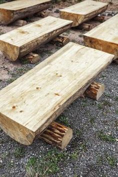 several pieces of wood sitting on the ground