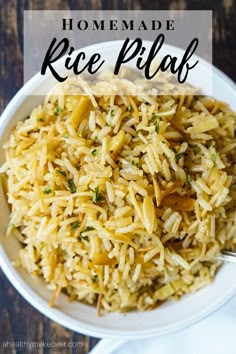 homemade rice pilaf in a white bowl with a spoon and napkin on the side