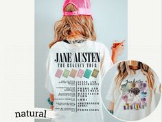 a woman wearing a white shirt and pink hat with the words jane musten on it