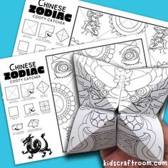 the chinese zodiac coloring book is open to show it's pages and instructions on how to