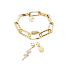 Our chunky Throwback Link Charm Bracelet is dipped to perfection in 24k gold. This look can be worn so many different ways. You can style it alone or layer it with some of our other favorites for a totally gorg look. You can dress it up for a night on the town or dress it down with a pair of jeans and a t-shirt! You can't go wrong with this piece. Don't forget to add your favorite charms too! Features: Lightweight Comfortable to wear Versatile Eye-catching and boho design High-quality dipped in Modern Charms Bracelets, Trendy Gold Bracelets With Charms, Trendy Gold Chain Bracelet With Charms, Gold Minimalist Chain Bracelet With Charms, Trendy Gold Bracelets With Extender, Gold Chain Bracelet With Charms For Everyday, Everyday Gold Chain Bracelet With Charms, Everyday Gold Bracelet With Charms, Gold Link Bracelets With Charms