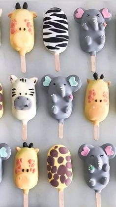 there are many animal lollipops on the stick