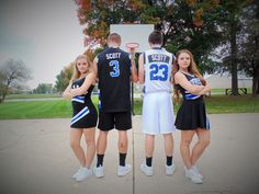 three young people standing in front of a basketball hoop with their hands on their hips