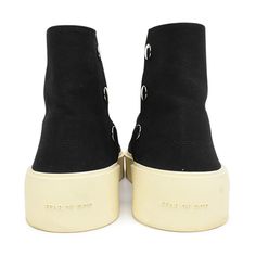 Fear Of God high-top sneakers in black canvas with a cream sole and silver snap buttons. Brand = Fear Of God Condition = 8/10, very good, light scuffing to sole Size = 43 Material = Canvas SKU = 22904-5 Canvas High-top Sneakers With Studded Outsoles, High-top Canvas Sneakers With Textured Sole, Fear Of God Sneakers, Fear Of God, Scarf Jewelry, Sneaker Collection, Black Canvas, Men's Collection, New Bag