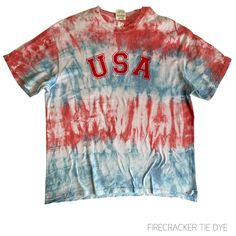 a red, white and blue tie - dyed shirt with the word usa on it