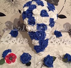 blue and white bridal bouquet with matching boutonniers, brooch pins