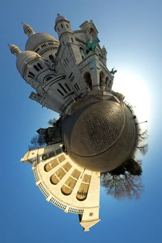 an upside down view of a building with a basketball in the foreground