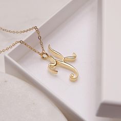 K Initial Necklace - Cursive "K" initial gold pendant necklace - Monogram necklace for women - Personalized gold Initial necklace for her Dainty "K" initial. Perfect every day necklace. Lovely gift for your self, sister, bridesmaids, new mom. Pendant: Base metal is brass and 14K gold plated. Chain is 18 inches, 14k gold filled. Note: model shots might show a different initial, only to illustrate overall look and length of the chain. This listing is for the "K" initial. Cursive K, K Initial Necklace, Every Day Necklace, K Initial, Gold Initial Pendant, Locket Design, Gold Pendent, Romantic Gifts For Him, Flower Resin Jewelry