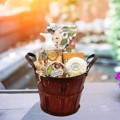 a wooden basket filled with lots of different items