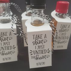 three small bottles with labels on them that say take a shot, i just wanted the shot