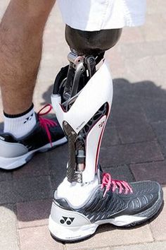 the legs and feet of a person wearing roller blades