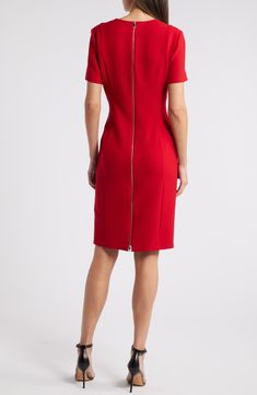 Make a bold entrance wherever you go in this sophisticated sheath dress made with a touch of stretch. 39" length Back zip closure V-neck Short sleeves Partially lined 67% viscose. 29% polyester, 4% elastane Machine wash, line dry Made in Turkey Elegant V-neck Dress With Zipper Closure, Fitted V-neck Midi Dress For Career, Fitted V-neck Bodycon Dress With Side Zipper, Fitted Bodycon Dress With V-neck And Side Zipper, Formal Elastane Midi Dress With Back Zipper, Modern Workwear Dress With Back Zipper, Modern Work Dress With Back Zipper, Bodycon V-neck Dress With Side Zipper, Fitted Knee-length Dress With Invisible Zipper