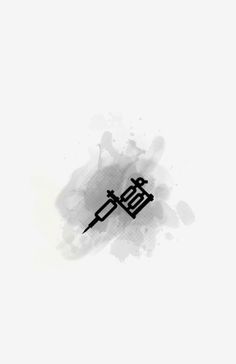 the chinese word is written in black ink on a white background with watercolor stains