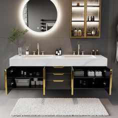 a bathroom with two sinks and mirrors on the wall