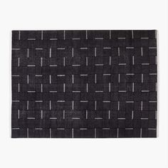 a black and white rug with squares on it