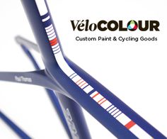 the front end of a blue bicycle with red, white and blue stripes on it