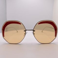 Authentic Fendi Sunglasses - Material Gold Medal With Yellow Lenses And Red Accents - Dimensions 63mm, 19mm, 140 Mm, New Without Tag But Has Fendi Case And Cleaning Cloth, And Uva Index 3. Fendi Accessories, Fendi Sunglasses, Gold Medal, Red Accents, Cleaning Cloth, Red Gold, Sunglasses Accessories, Lenses, Fendi