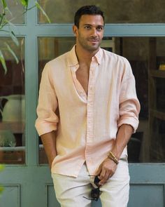 Men's classic lightweight linen shirt WENGEN in light pink is a wardrobe staple both for formal and casual dressing. It has all the design details of a classic shirt, therefore you can include this shirt into your office outfits. Made from lightweight breathable linen fabric this shirt is also a perfect choice for laid-back summer days. You can wear this shirt open or buttoned down, tucked into linen pants or loose, with the sleeves rolled up or down. Details: * Regular fit * Shirt-style collar Collared Shirt Outfit Men, Summer Wedding Menswear, Mens Linen Outfits, Pink Shirt Men, Tan Linen Pants, Long Sleeve Linen Shirt, White Pants Outfit, Light Pink Shirt, Wrinkled Clothes