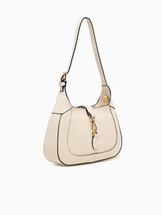 Kenny Shoulder Bag Panna Cream Top Handle Baguette Bag, Chic Cream Satchel With Adjustable Handle, Cream Hobo Bag With Gold-tone Hardware, Chic Cream Baguette Bag With Double Handle, Everyday Cream Hobo Bag With Gold-tone Hardware, Cream Hobo Bag With Gold-tone Hardware For Everyday, Chic Cream Baguette Bag With Gold-tone Hardware, Cream Baguette Shoulder Bag With Gold-tone Hardware, Cream Tote Bags With Gold-tone Hardware