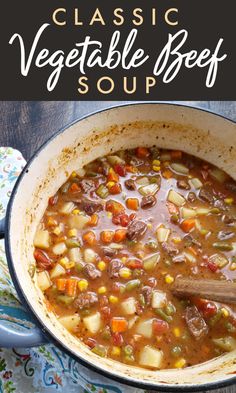 a pot full of vegetable beef soup with a wooden spoon in it and text overlay reading classic vegetable beef soup