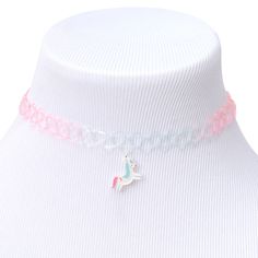 Pastel is the go-to look this season! Be on trend with this unicorn choker necklace. This choker has an effortless ombre of pink & white, that give way to a unicorn pendant in front. Layer this choker with other silver-tone necklaes, and pair your look with a trendy graphic tee for an edgy vibe, or wear individually for a touch of glam. Choker by Claire's Club Stretch fit Material: Plastic Suitable for ages 3+ - Claire's Club Unicorn Choker Necklace Adjustable Pink Trendy Choker, Pink Trendy Adjustable Choker, Pink Adjustable Trendy Choker, Cute Adjustable Choker Jewelry, Cute Silver Choker Jewelry, Unicorn Set, Unicorn Fashion, Unicorn Pendant, Chantel Jeffries