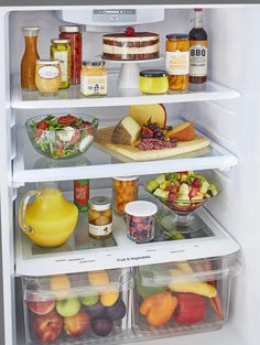 an open refrigerator filled with lots of food