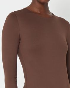 Price Comparison Few Moda $39 Aritzia $108 Reformation $120 Product Details Achieve effortless style with the Contouring Crew Longsleeve Bodysuit. Its simple look creates a sleek silhouette with a high neckline and fitted long sleeves. This bodysuit is sure to become a wardrobe staple - Stretchy and smoothing- Thong back- Snap closures- Content: 90% Nylon, 10% Spandex- Please note this item is final sale, no return or exchanges due to hygiene reasons. Style# C22KBS98757 Fit Notes - Model wearing Simple Look, Hip Style, Price Comparison, High Neckline, Effortless Style, Wardrobe Staples, Final Sale, How To Become, Sleek