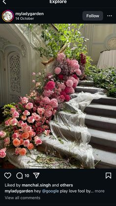 an image of flowers that are on the stairs