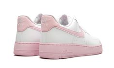 The Nike Air Force 1 Low '07 has returned with yet another vibrant colorway of the iconic silhouette.  A pastel update for the white sneaker fan, this low-top Air Force 1 features a light pink take on the brand’s signature Nike Swoosh on the side and heel tab.  On the lower half, a corresponding light pink sole completes the look and juxtaposes nicely with the all-white leather up top.  Nike Air branding appears on the tongue, heel, and midsole. Sporty Nike Air Force 1 For Spring Streetwear, Nike Custom Sneakers With Gum Sole For Spring, Pastel Sneakers With Rubber Sole For Streetwear, Pastel Sneakers For Spring Streetwear, Nike Air Force 1 Sporty Spring Edition, Spring Nike Air Force 1 Sporty Style, Nike Air Force 1 Sporty Style For Spring, Nike Custom Sneakers For Spring Streetwear, Sporty Nike Air Force 1 For Spring