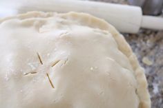 an uncooked pastry sitting on top of a counter