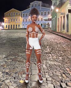 an animated woman standing on a cobblestone street