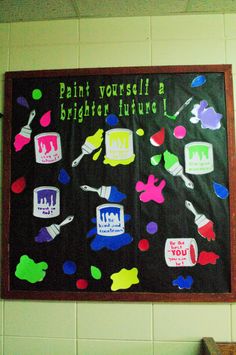 a bulletin board that has been decorated with different things on it, including spoons and spatulas