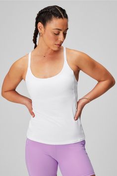 On-The-Go Built-In Bra Tank Fabletics white female Activewear >> Womens >> Tops >> Tanks regular Training Built-in Bra Racerback style with a built-in bra Supportive White Go-dry Activewear, Casual White Supportive Activewear, Supportive White Tops, White Tank Top With Built-in Bra For Gym, White Stretch Activewear With Built-in Bra, Supportive White Sleeveless Activewear, Athleisure Tops With Adjustable Straps For Light Exercise, White Fitted Tank Top For Light Exercise, Fitted White Go-dry Tank Top