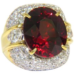 Raised Dome Spessartite GIA 28.64ct. Natural Red Spessartite & 4.00ct. diamonds ring. GIA Certified Report ID: 2105439004 17.14 X 14.58 X 12.84mm Full cut oval brilliant Clean Clarity & Transparent 4.00ct. Diamonds. Rounds Full cuts G-color Vs-2 clarity. 18kt. yellow gold 21 grams Ring Current size: 6 (Free Resize Service, Please inquire) Ring: .89 inch wide Depth: .53 inch $36,000 Appraisal Certificate to accompany Red Diamond Ring, Tsavorite Ring, Interesting Jewelry, Garnet And Diamond Ring, Spessartite Garnet, Garnet Gem, Fancy Yellow Diamond, Ruby Diamond Rings, Dome Ring