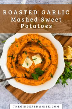 roasted garlic mashed sweet potatoes in a white bowl with butter and parsley on top